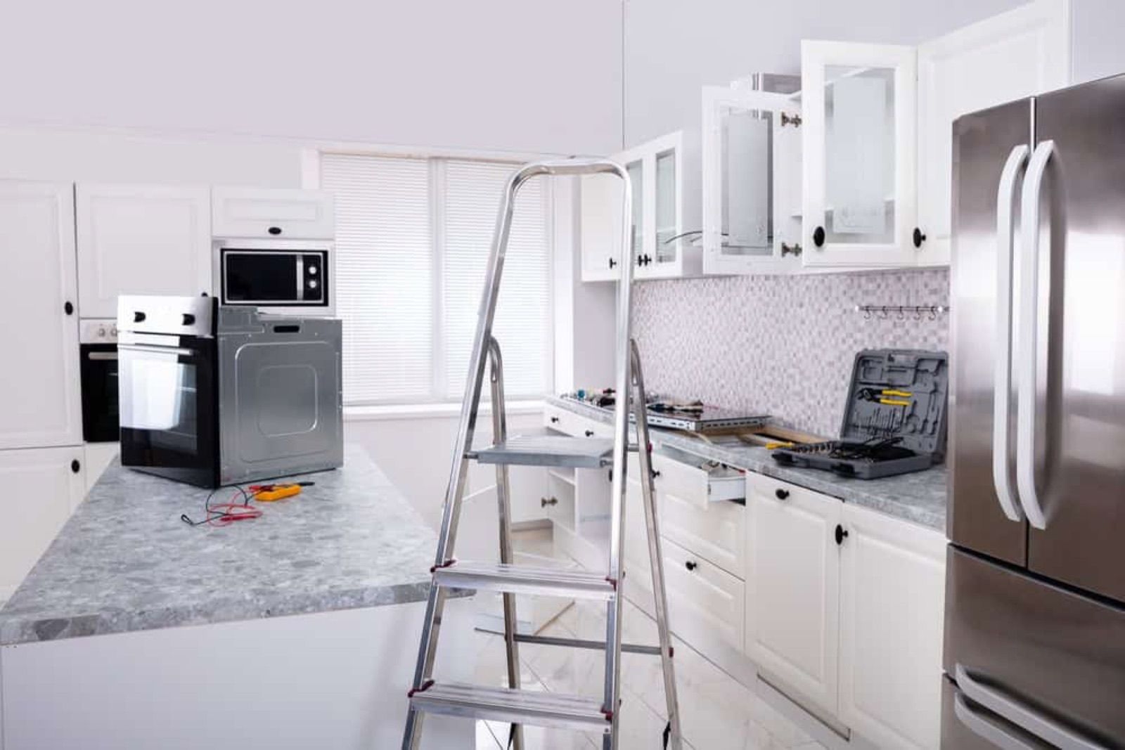 Kitchen with new appliances during an install